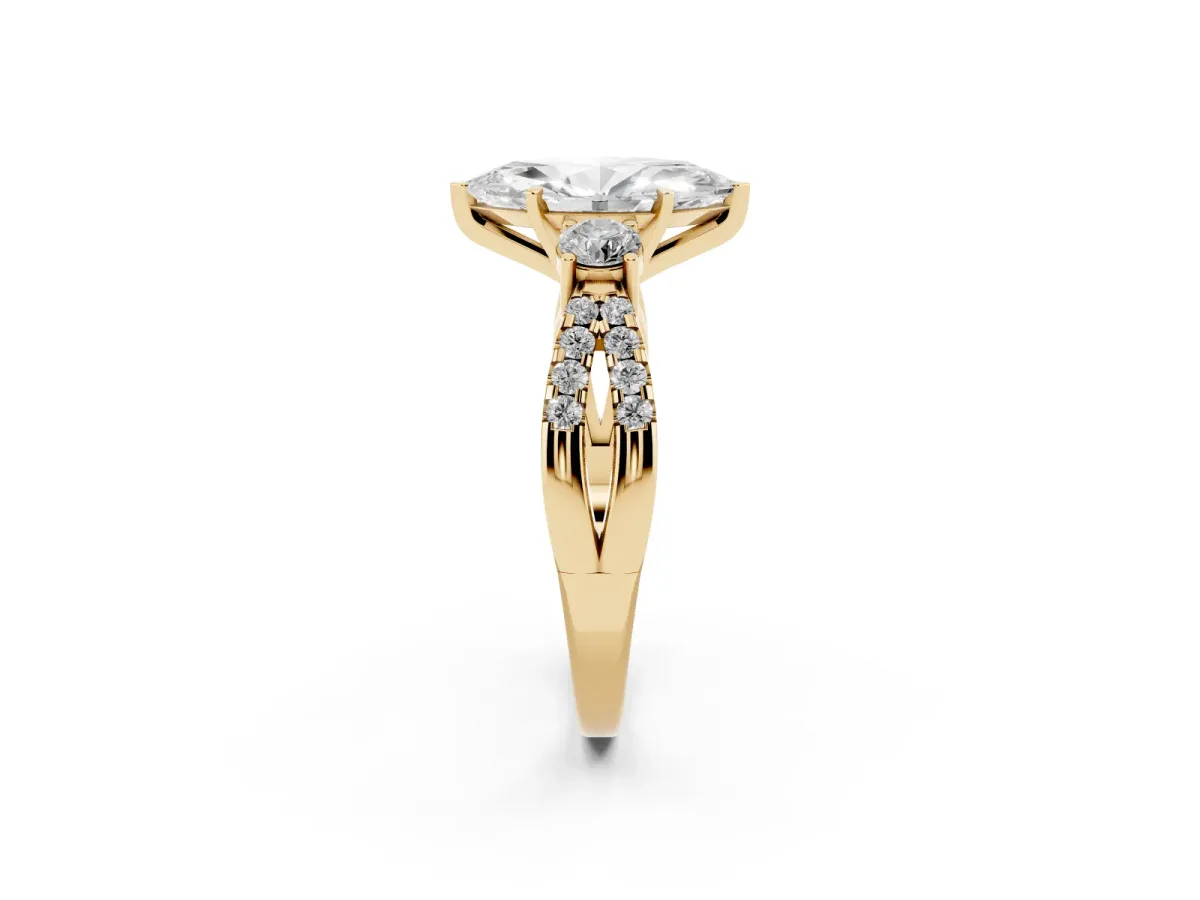 Marquise Cut Diamond Three-Stone Ring with Pavé Split Shank and Four-Prong Setting Yellow gold