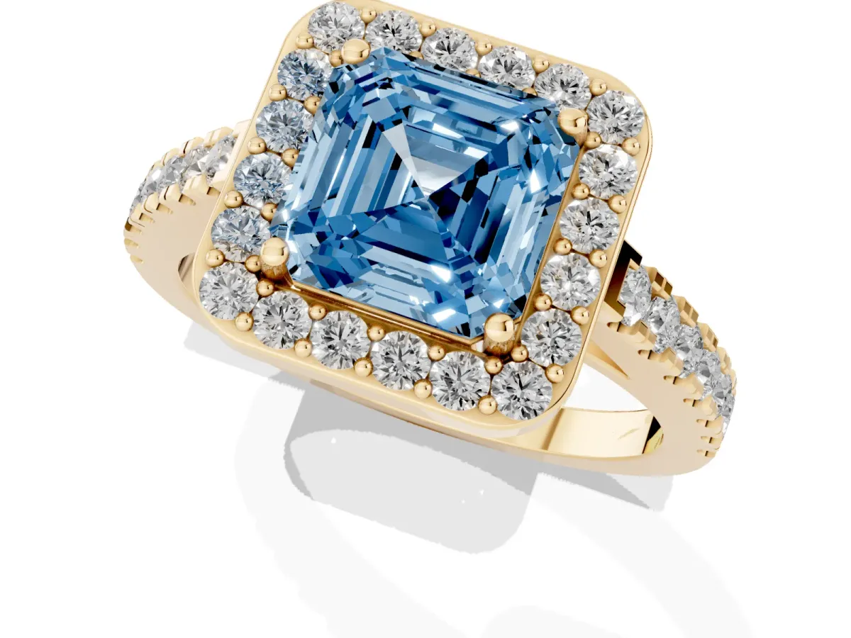 Fancy Blue Asscher Cut Diamond Halo Ring with Round Pavé Split Shank and Prong Setting Yellow gold