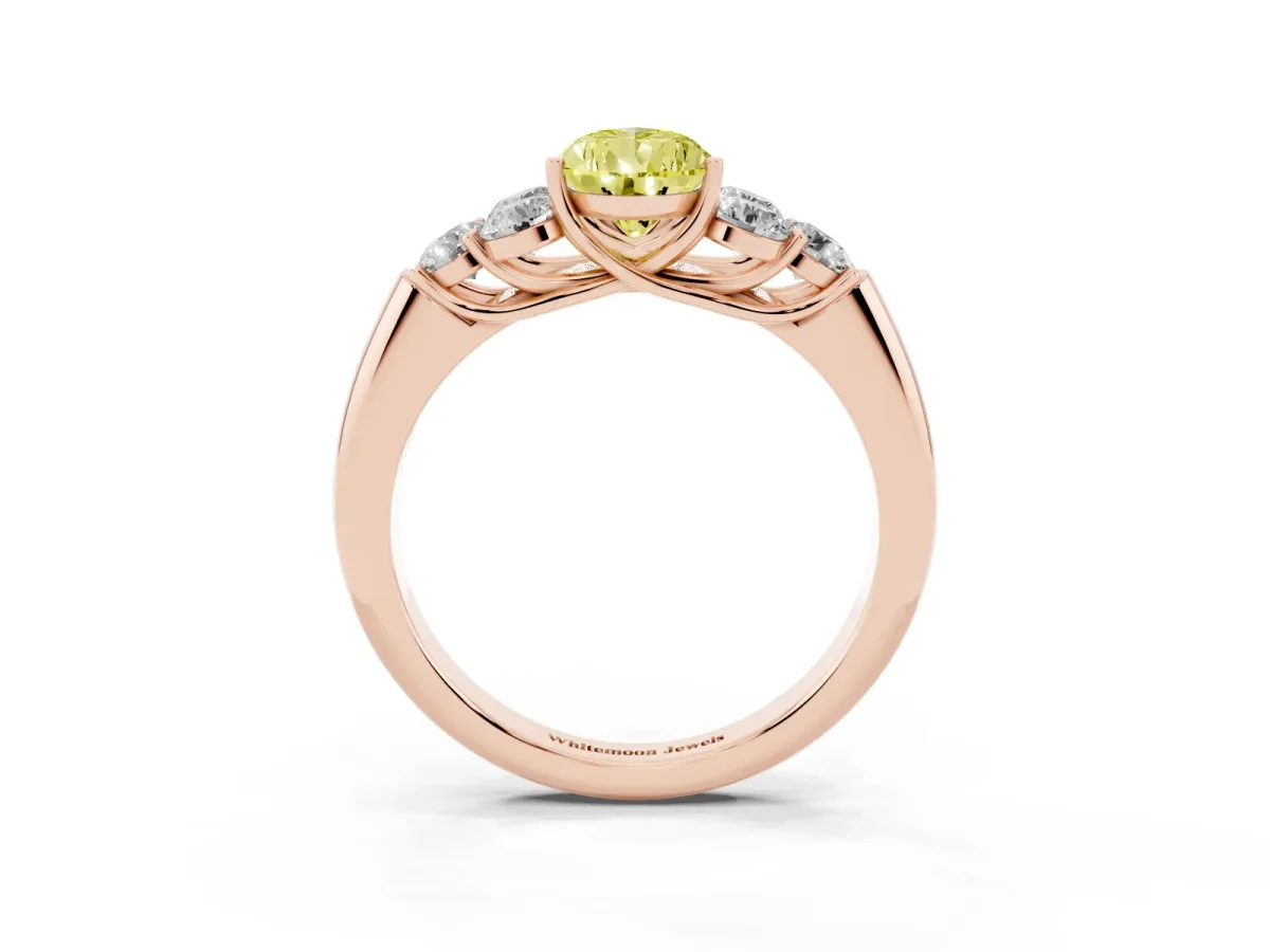 Fancy Yellow Pear Cut Cut Diamond Cluster Ring with Round Accent Stones and Prong Setting on a Classic Band Rose gold