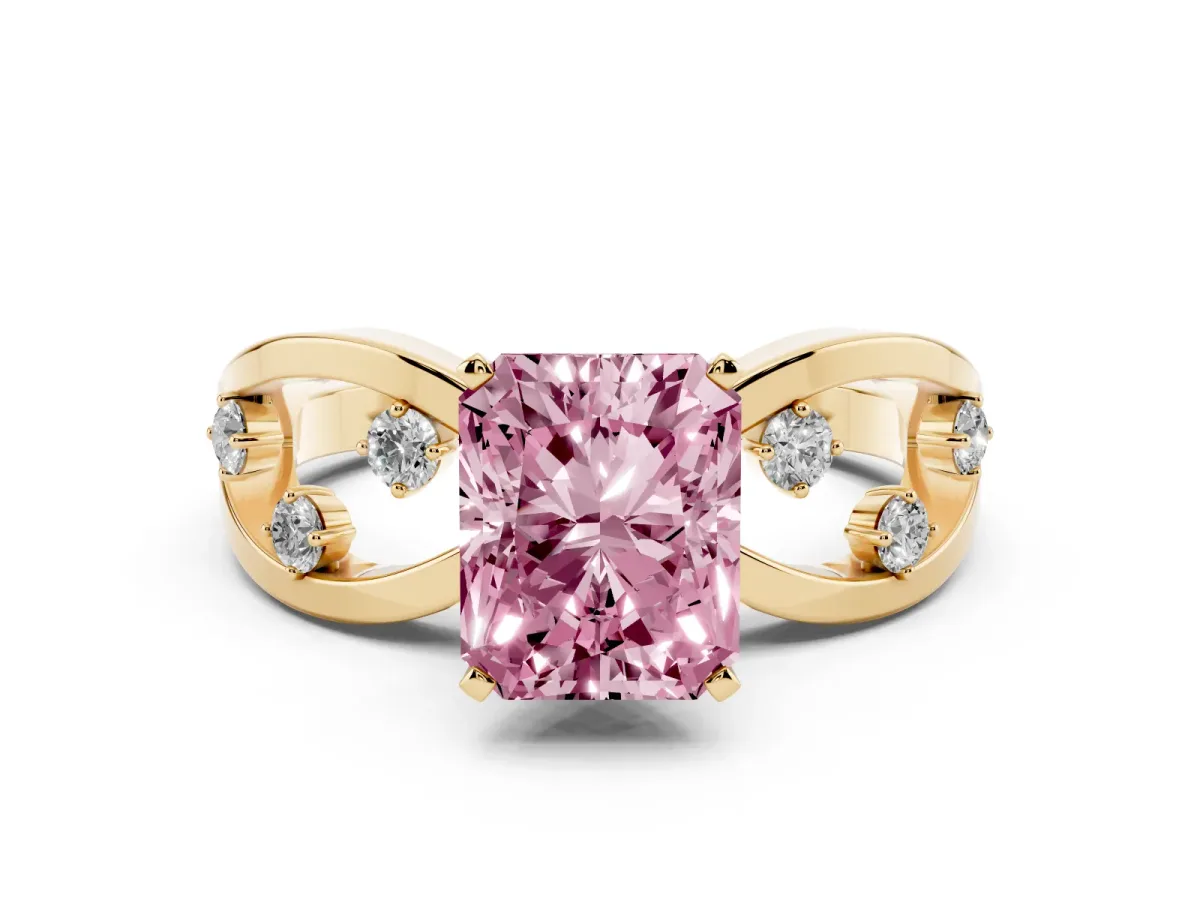 Fancy Pink Radiant Cut Cut Solitaire Diamond with Side Stones on Criss-Cross Band and Four-Prong Setting Yellow gold