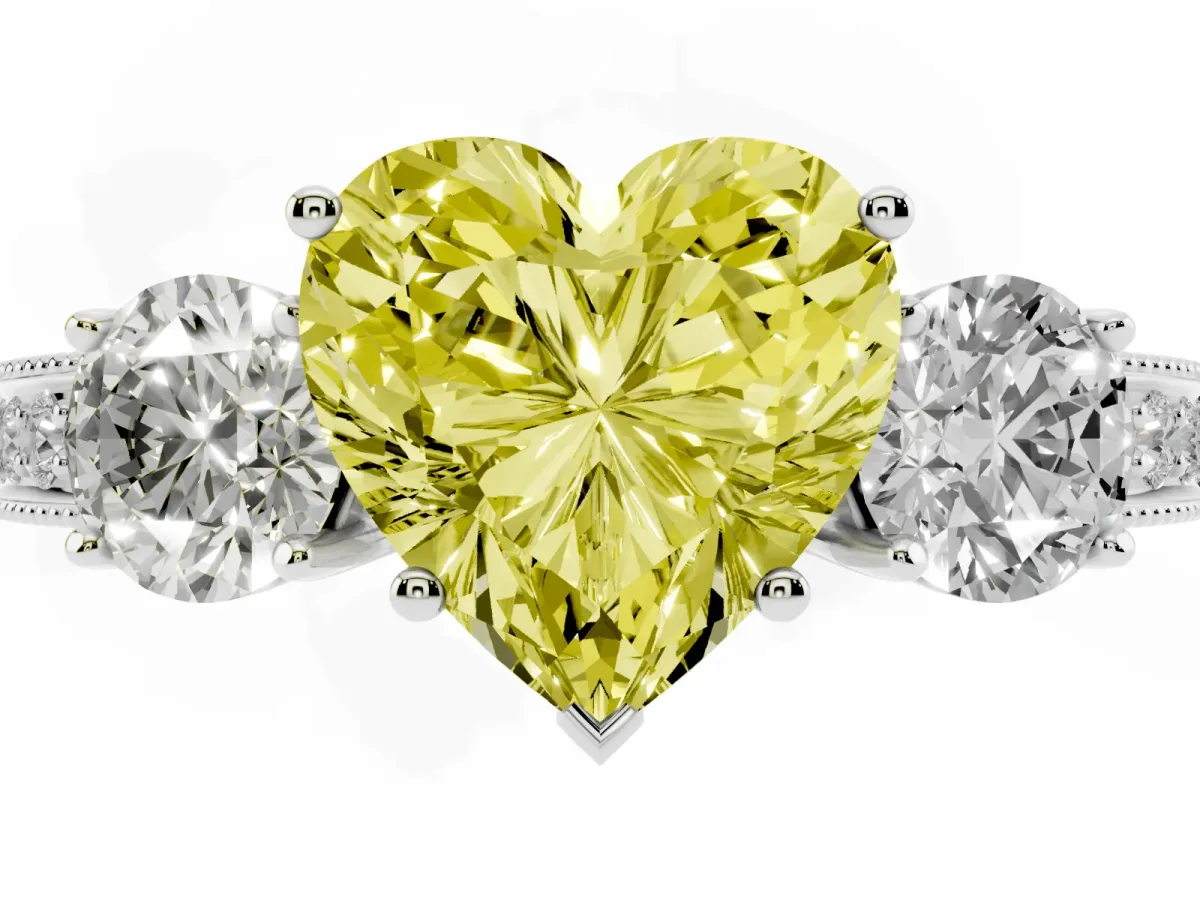 Fancy Yellow Heart Cut Three-Stone Diamond Ring with Pavé Band and Four-Prong Setting Silver
