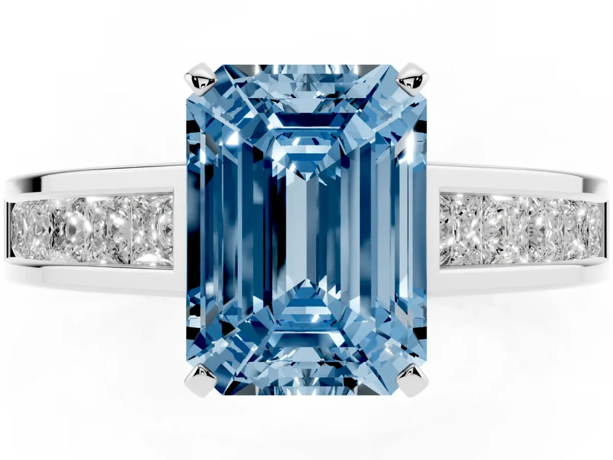 Fancy Blue Emerald Cut Solitaire Diamond Ring with Channel-Set Band and Four-Prong Setting Silver