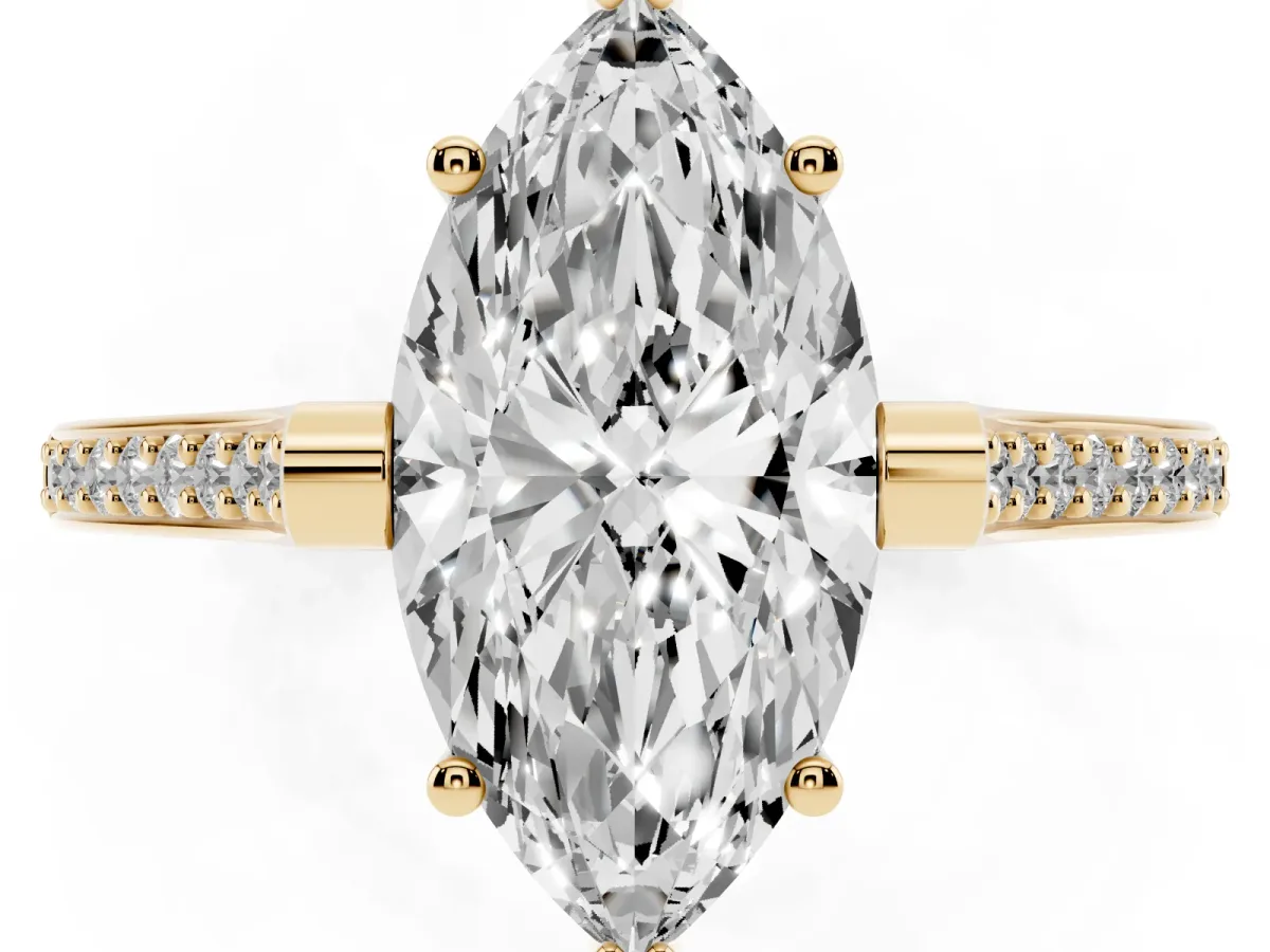 Marquise Cut Solitaire Diamond Ring with Channel Set Band and Bezel Prong Setting Yellow gold