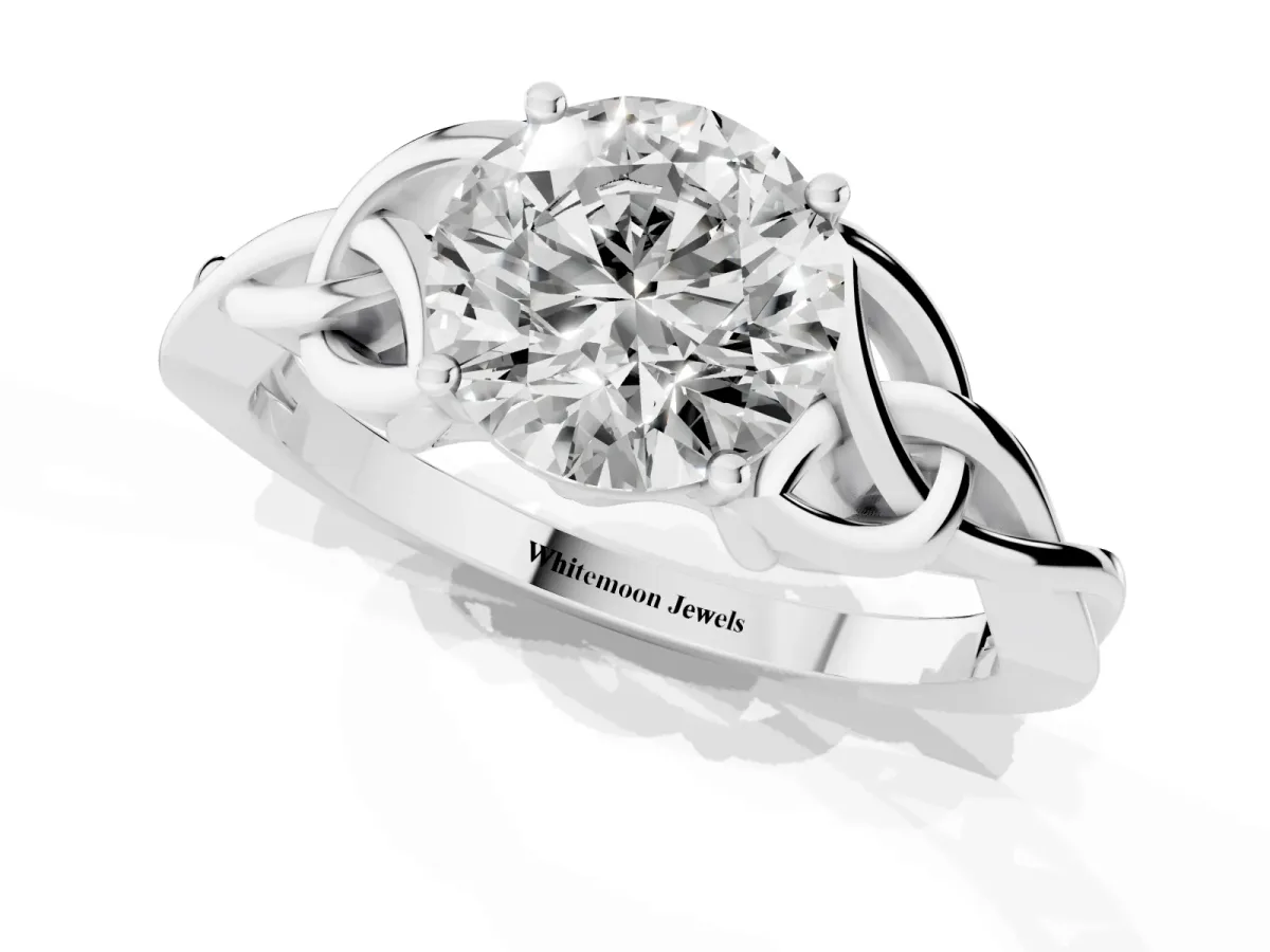Round Cut Diamond Solitaire Engagement Ring with Celtic Knot Band and Four-Prong Setting Platinum