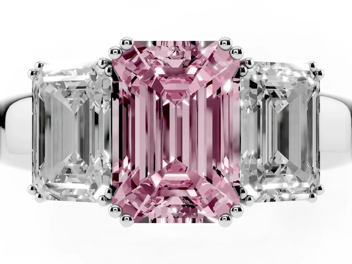 Fancy Pink Three-Stone Emerald Cut Cut Diamond Ring with Channel Set Band and Four-Prong Setting Silver