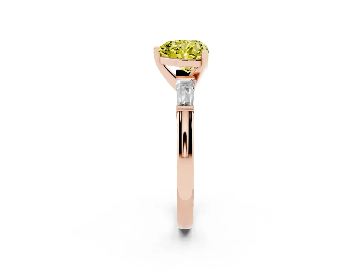 Fancy Yellow Heart Cut Solitaire with Tapered Baguette Side Stones on a Classic Band with Four-Prong Setting Rose gold