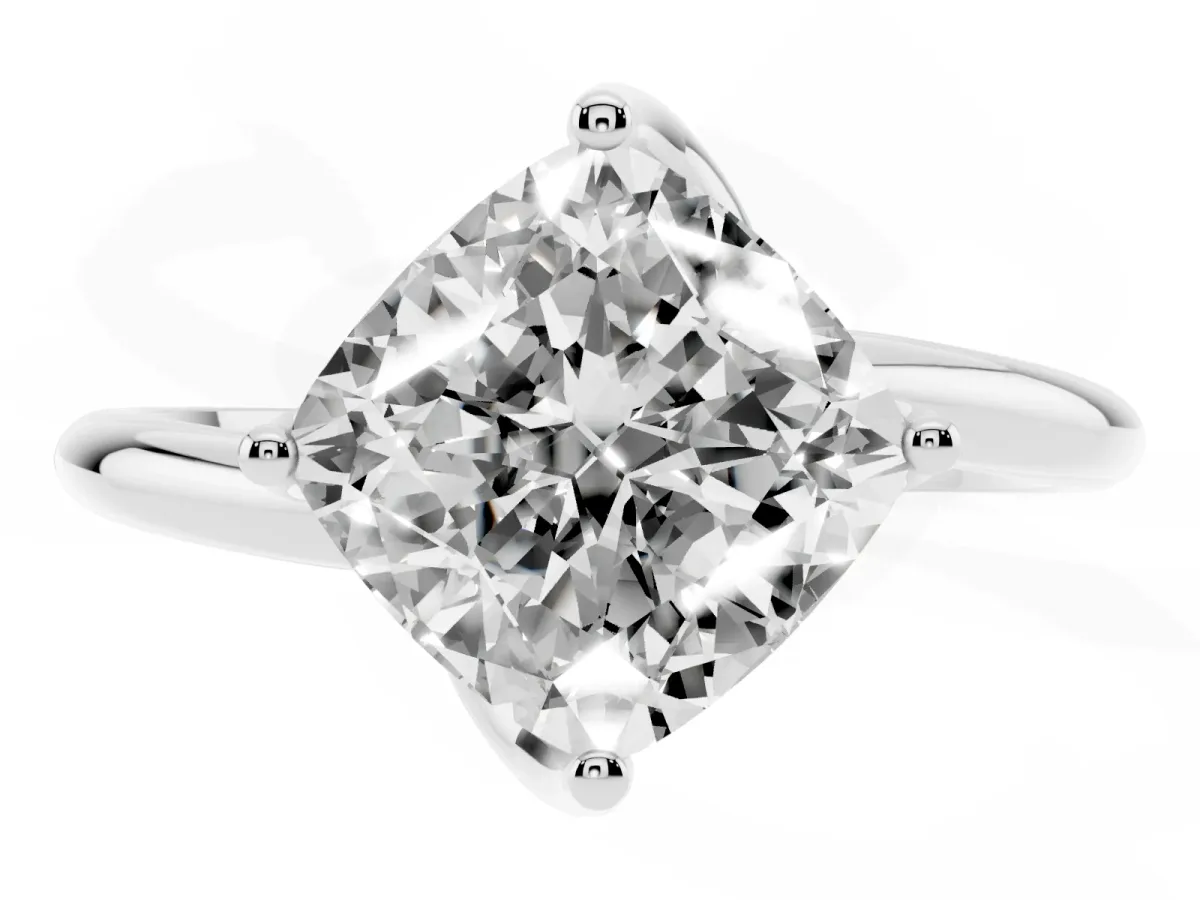 Cushion Cut Diamond Solitaire Engagement Ring with Four-Prong Setting and Classic Band Silver