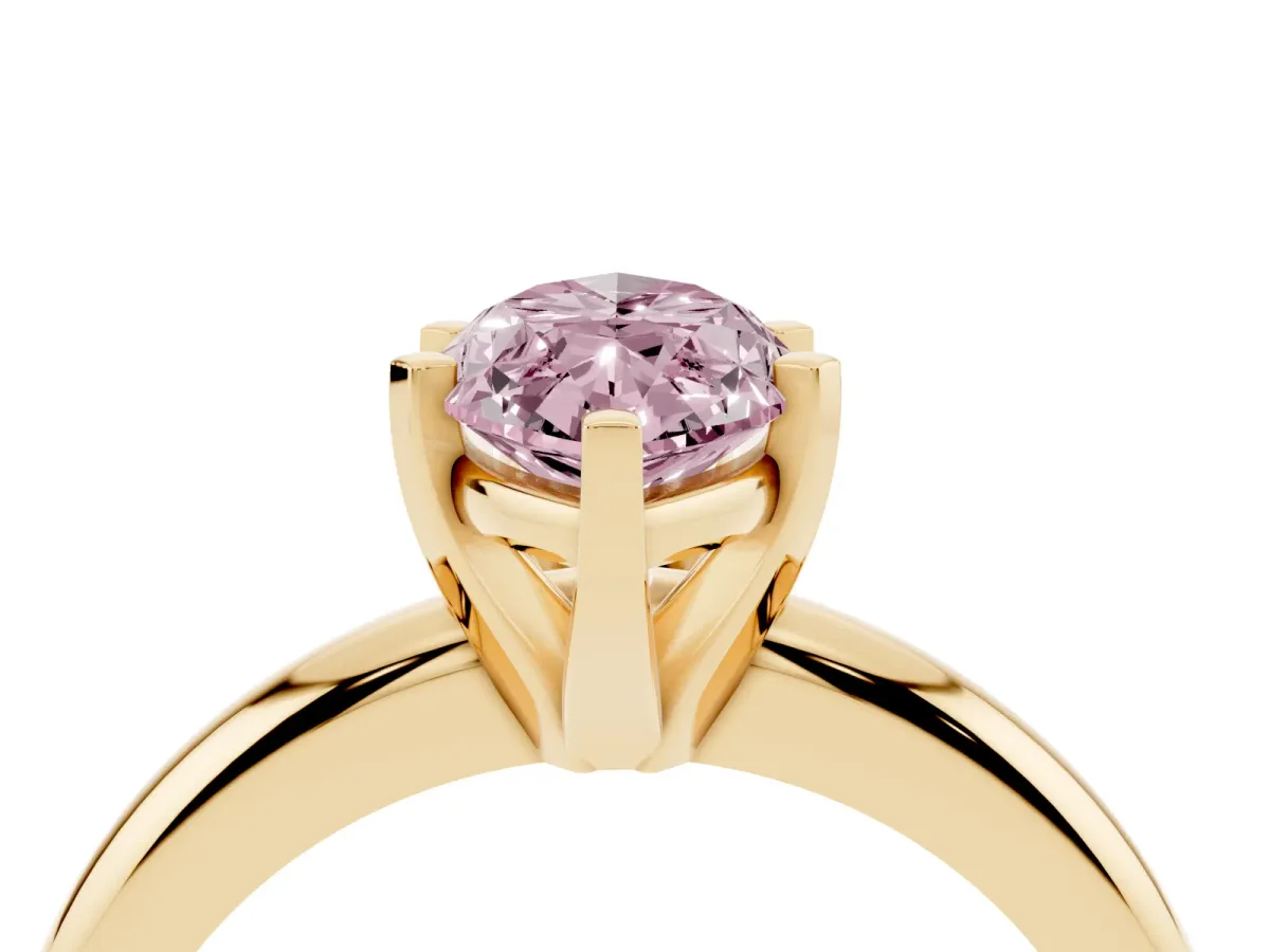 Fancy Pink Marquise Cut Diamond Solitaire Engagement Ring with Round Band and Four-Prong Setting Yellow gold