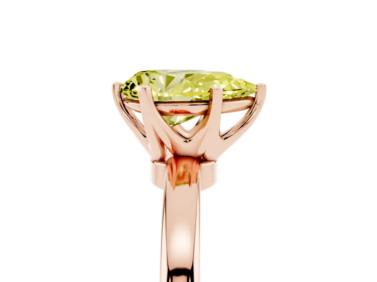 Fancy Yellow Pear Cut Solitaire Diamond Ring with Six-Prong Setting on a Classic Band Rose gold