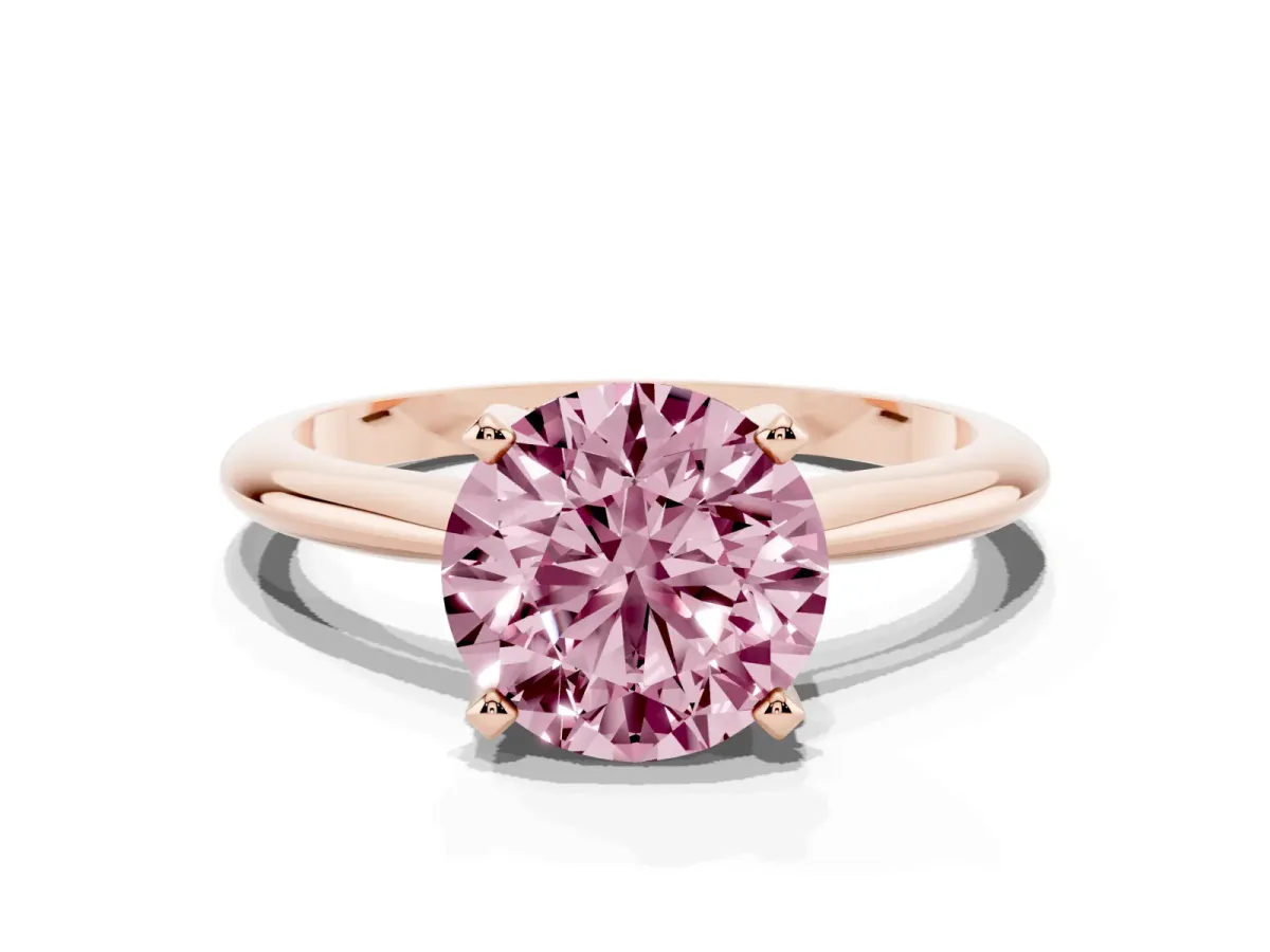Fancy Pink Round Cut Cut Solitaire Ring with Four-Prong Setting on a Classic Band Rose gold