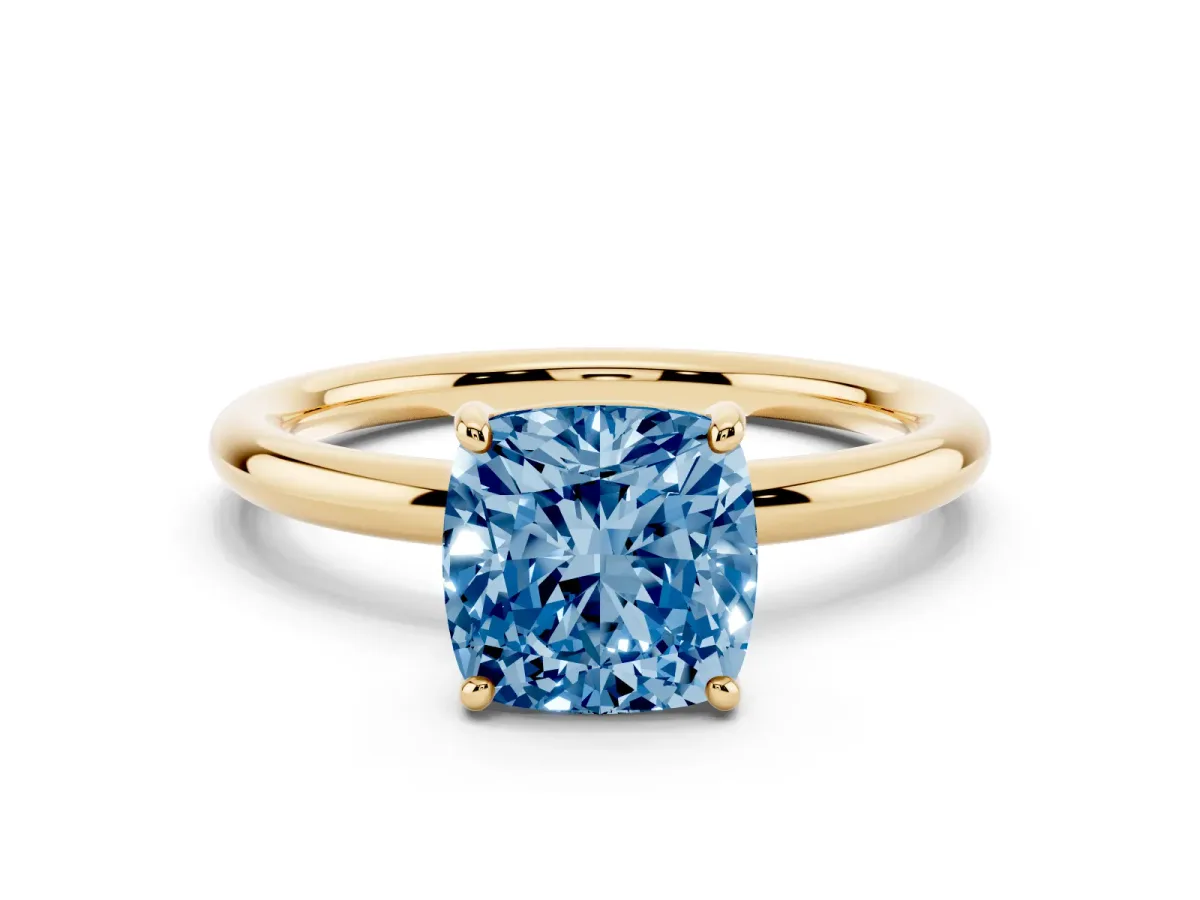 Fancy Blue Cushion Cut Solitaire Diamond Ring with Four-Prong Setting on a Plain Band Yellow gold