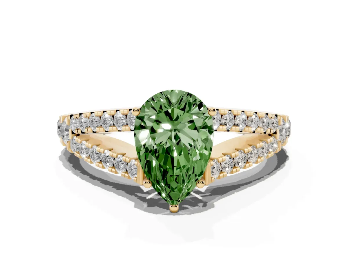 Fancy Green Pear Cut Diamond Split Shank Pavé Engagement Ring with Four-Prong Setting Yellow gold