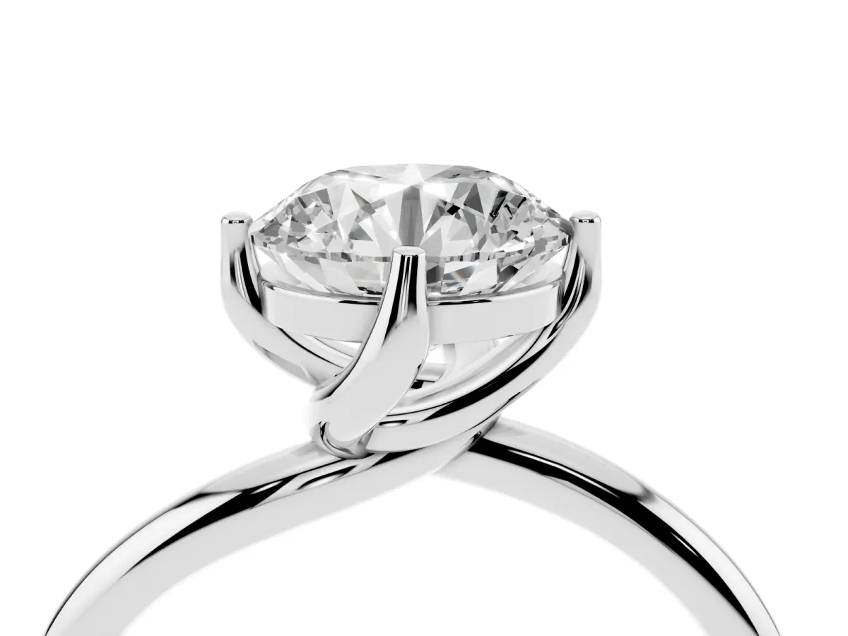 Round Cut Diamond Solitaire Engagement Ring with Four-Prong Setting and Classic Band Silver