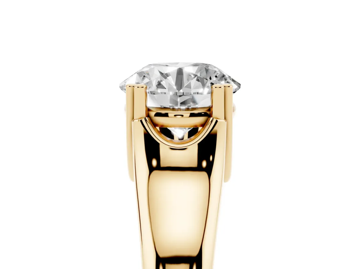 Round Cut Diamond Solitaire Ring with Wide Band and Prong Setting Yellow gold