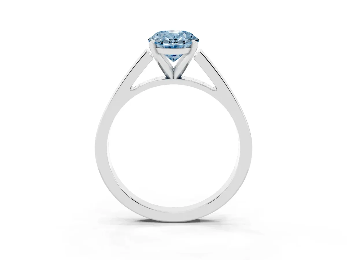 Fancy Blue Oval Cut Solitaire Engagement Ring with Four-Prong Setting and Tapered Band Silver