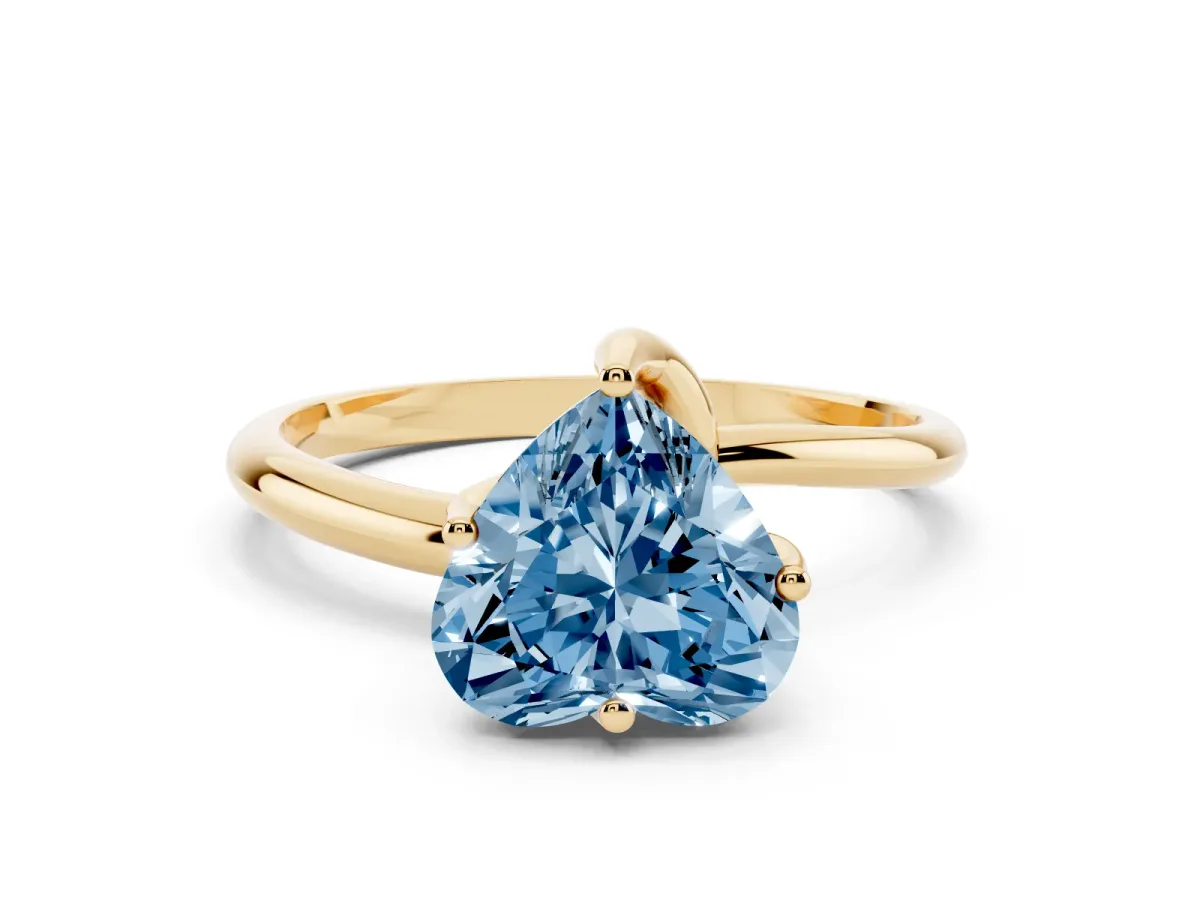 Fancy Blue Heart Cut Diamond Solitaire Engagement Ring with Four-Prong Setting and Classic Band Yellow gold