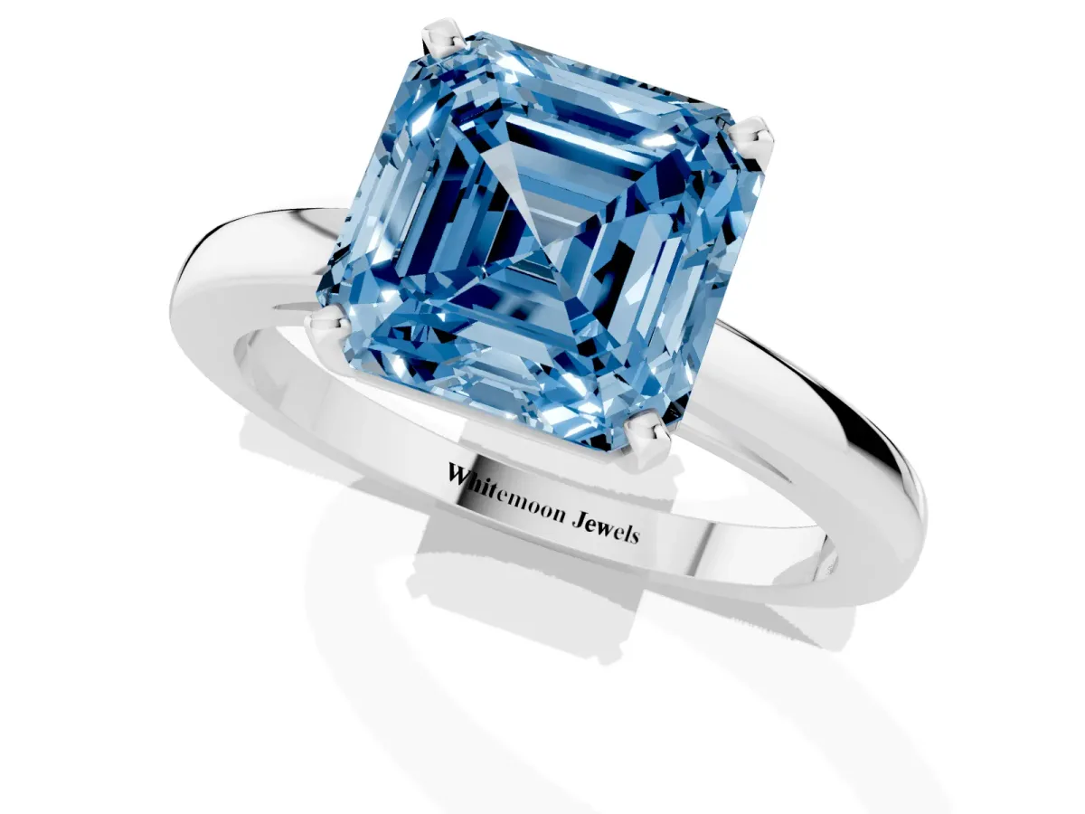 Fancy Blue Asscher Cut Solitaire Diamond Engagement Ring with Four-Prong Setting on a Classic Band Silver