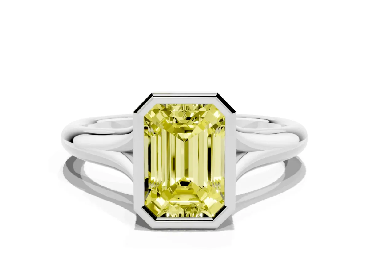 Fancy Yellow Bezel Set Emerald Cut Solitaire Diamond Ring with Smooth Band Silver