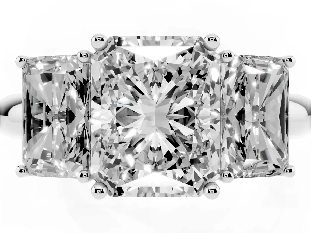 Three-Stone Radiant Cut Cut Diamond Engagement Ring with Prong Setting on a White Gold Band Platinum