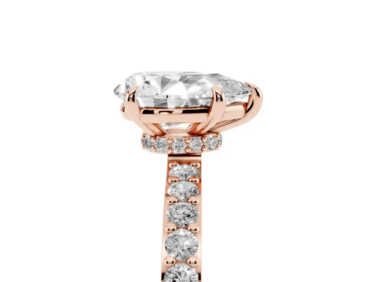 Pear Cut Diamond Pavé Engagement Ring with Round Accents and Prong Setting Rose gold