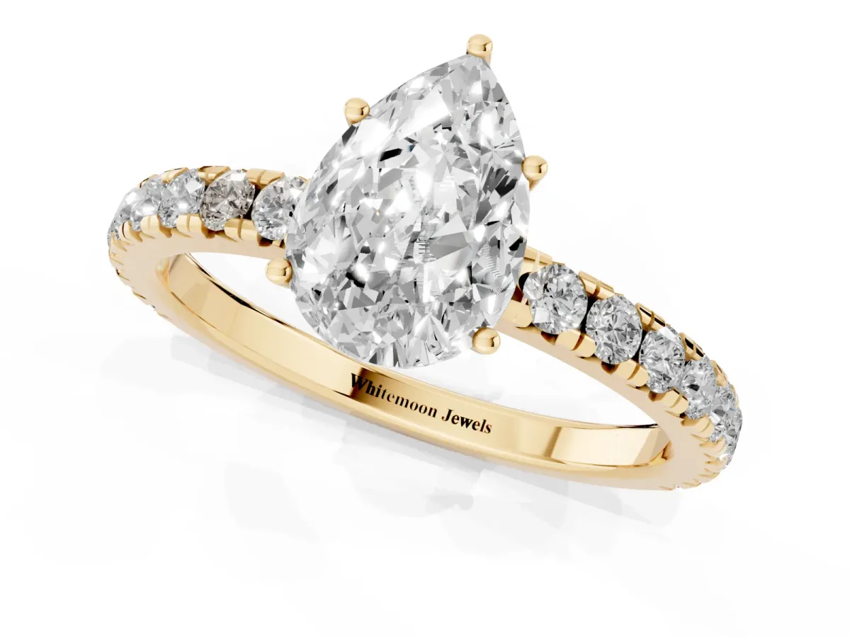 Pear Cut Diamond Pavé Solitaire Engagement Ring with Four-Prong Setting Yellow gold
