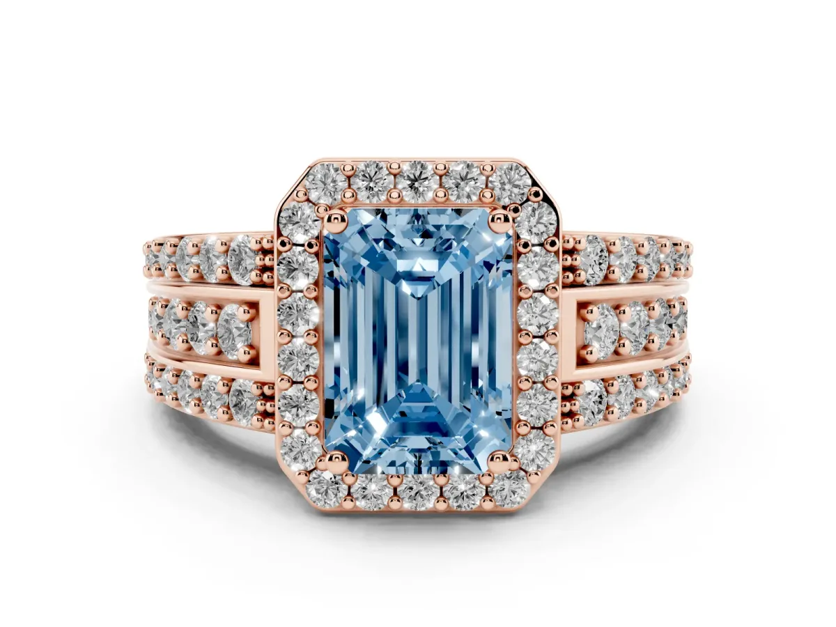 Fancy Blue Emerald Cut Halo Diamond Ring with Round Split Shank and Prong Setting Rose gold