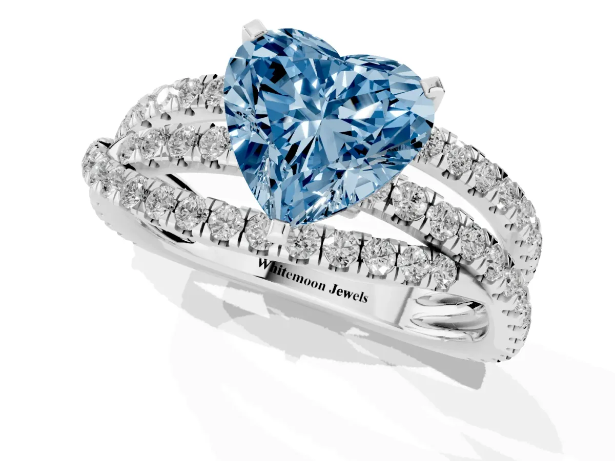 Fancy Blue Heart Cut Solitaire Twist Band with Pavé Setting and Four-Prong Setting Silver