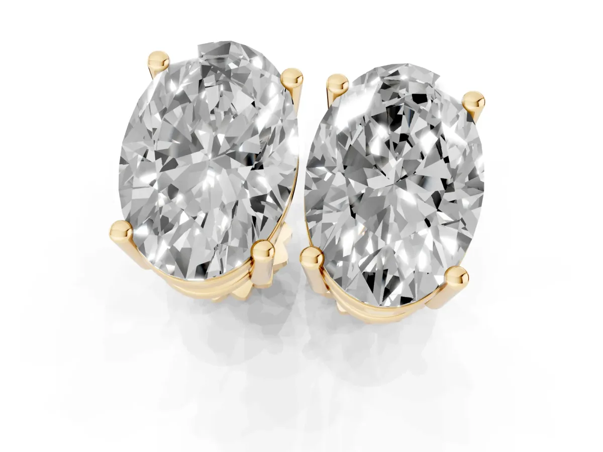 Oval Cut Diamond Stud Earrings Yellow gold