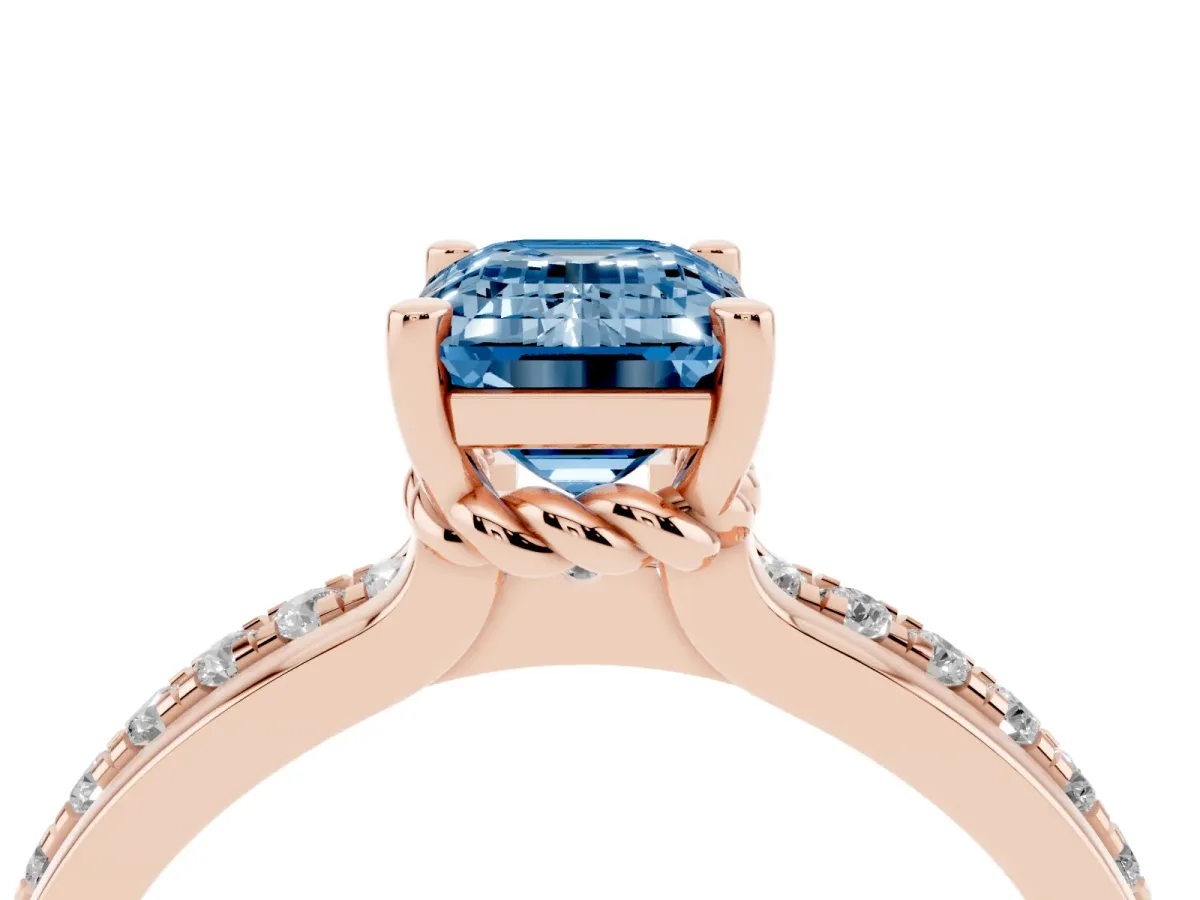 Fancy Blue Emerald Cut Solitaire Diamond Ring with Channel Set Band and Six-Prong Setting Rose gold