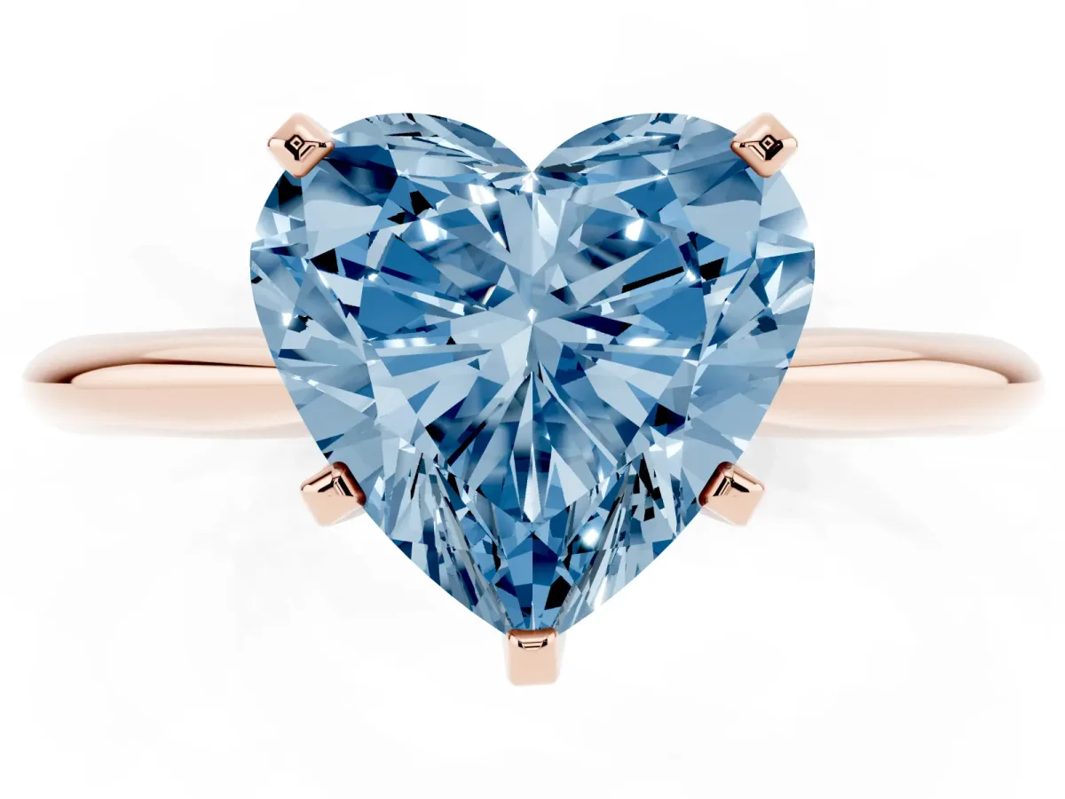 Fancy Blue Heart Cut Cut Solitaire Ring with Four-Prong Setting on a Classic Band Rose gold