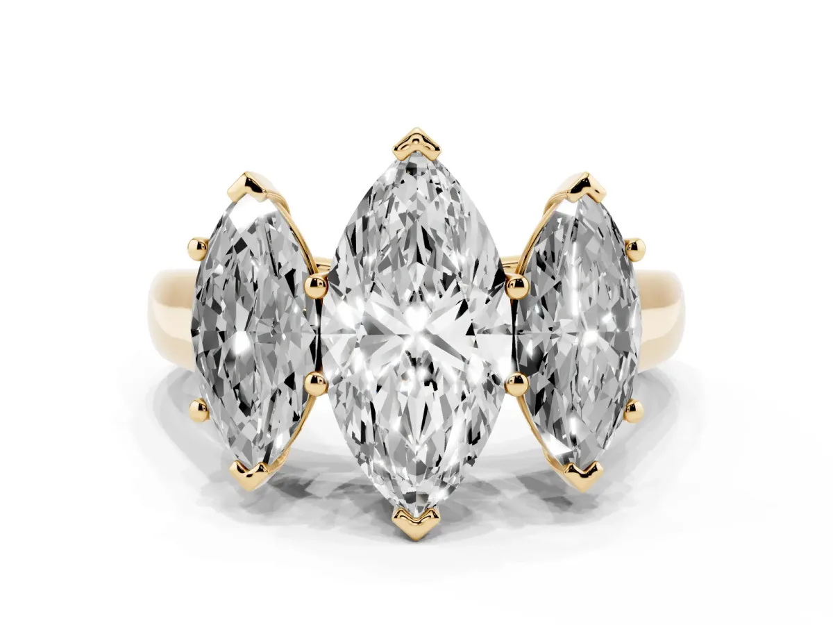 Marquise Cut Three-Stone Diamond Ring with Prong Setting on a Classic Band Yellow gold