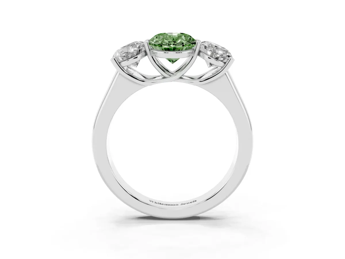 Fancy Green Oval Cut Three-Stone Diamond Ring with Prong Setting on a Classic Band Platinum