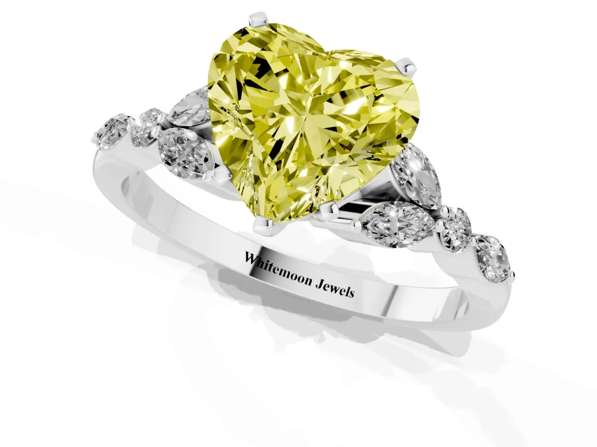 Fancy Yellow Heart Cut Diamond Solitaire Ring with Side Stones and Four-Prong Setting Platinum