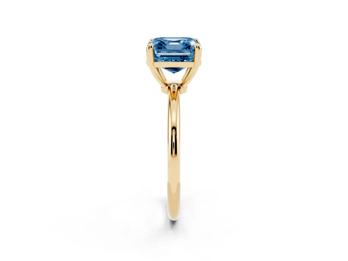 Fancy Blue Asscher Cut Solitaire Diamond Ring with 4-Prong Setting on a Classic Band Yellow gold