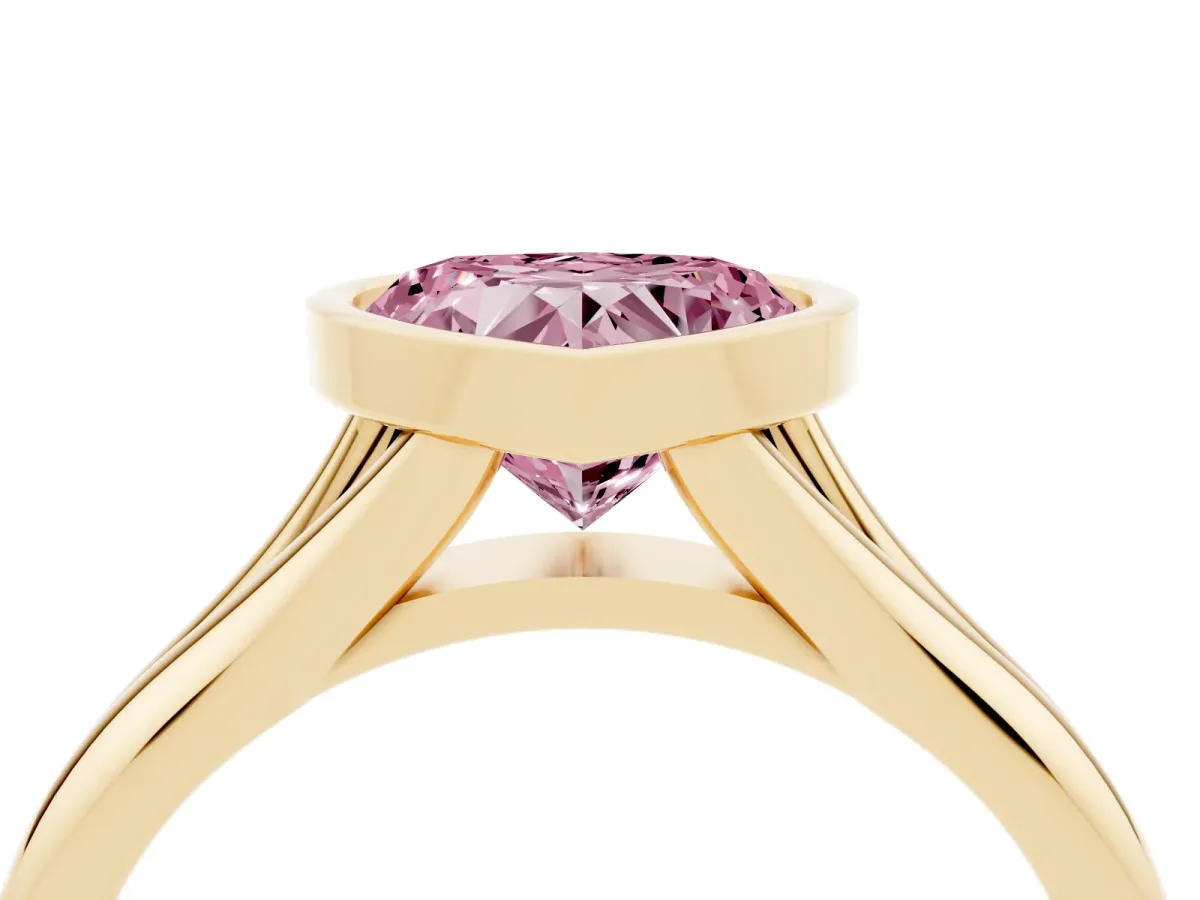 Fancy Pink Bezel Set Heart Cut Solitaire Diamond Ring with Smooth Band Yellow gold