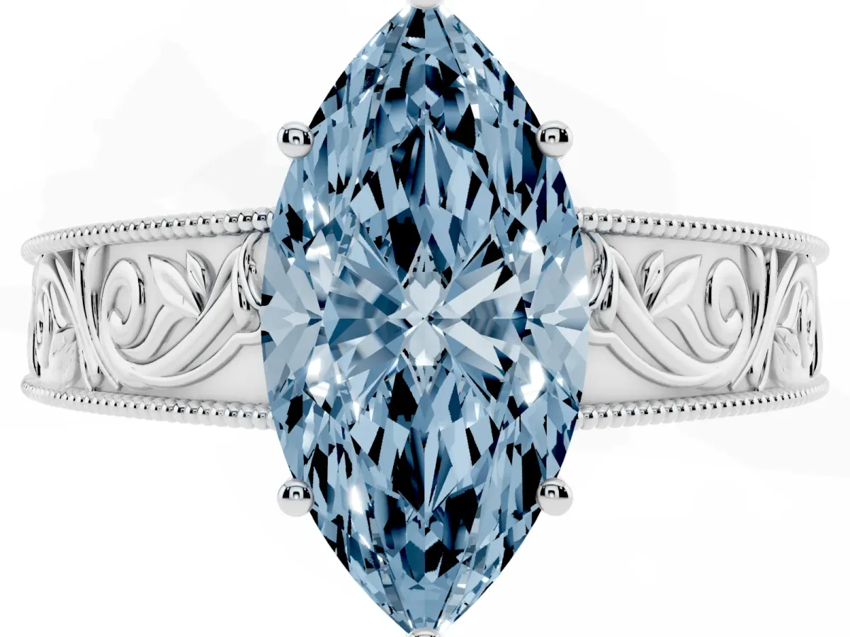 Fancy Blue Marquise Cut Diamond Solitaire Ring with Engraved Band and Four-Prong Setting White gold