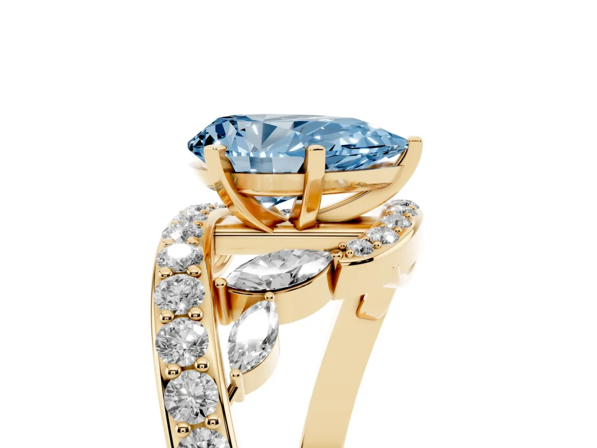 Fancy Blue Pear Cut Solitaire with Pavé Twist Band and Four-Prong Setting Yellow gold