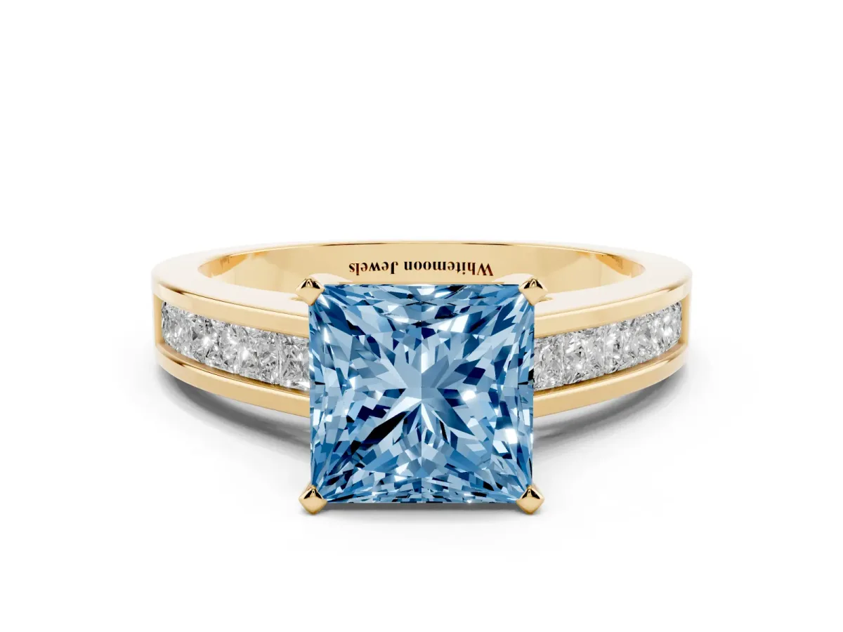 Fancy Blue Princess Cut Solitaire Diamond Ring with Channel-Set Band and Four-Prong Setting Yellow gold