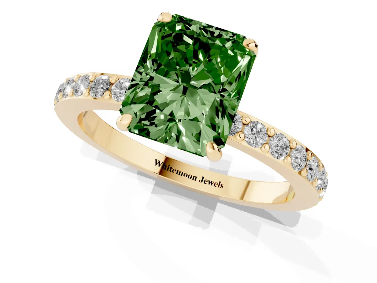 Fancy Green Radiant Cut Diamond Pavé Engagement Ring with Round Accents and Prong Setting Yellow gold