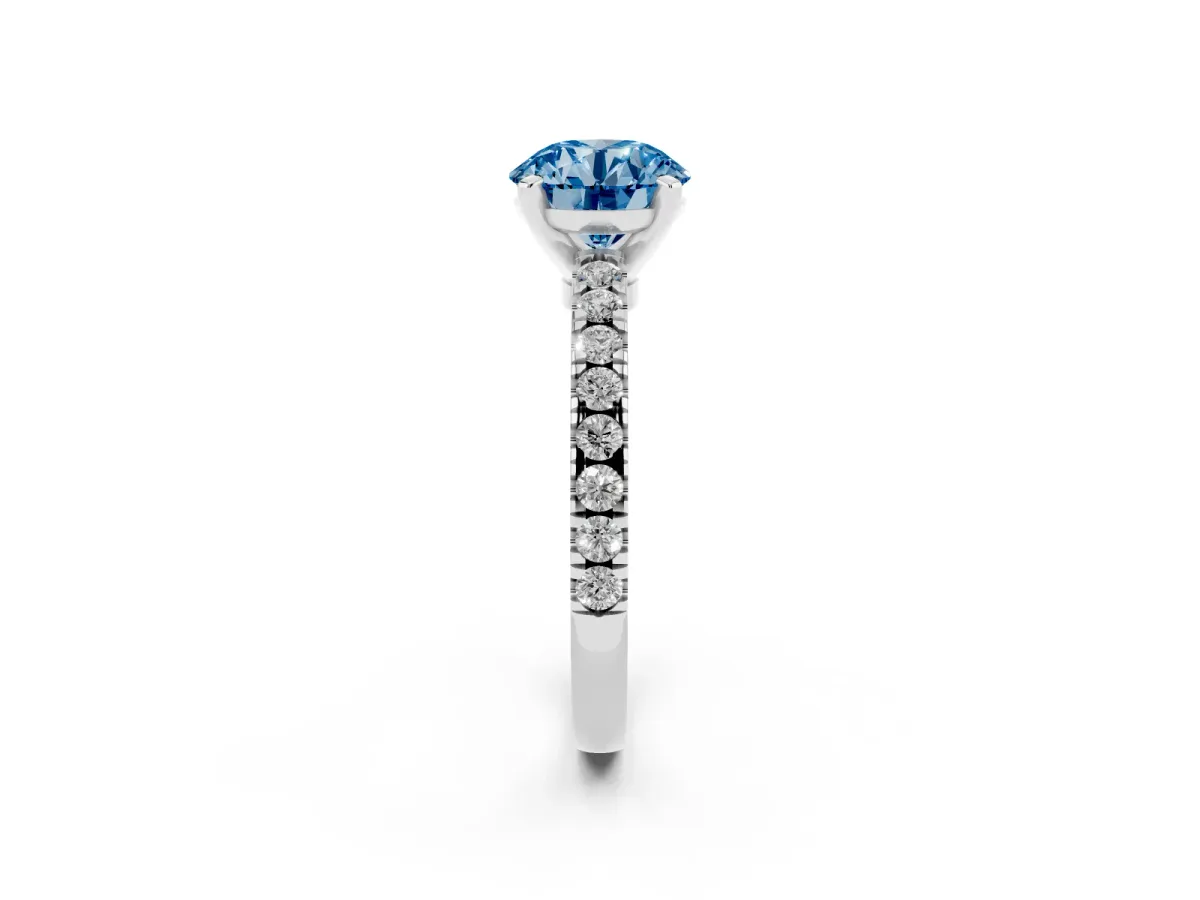 Fancy Blue Round Cut Solitaire Diamond with Pavé Band and Four-Prong Setting Silver