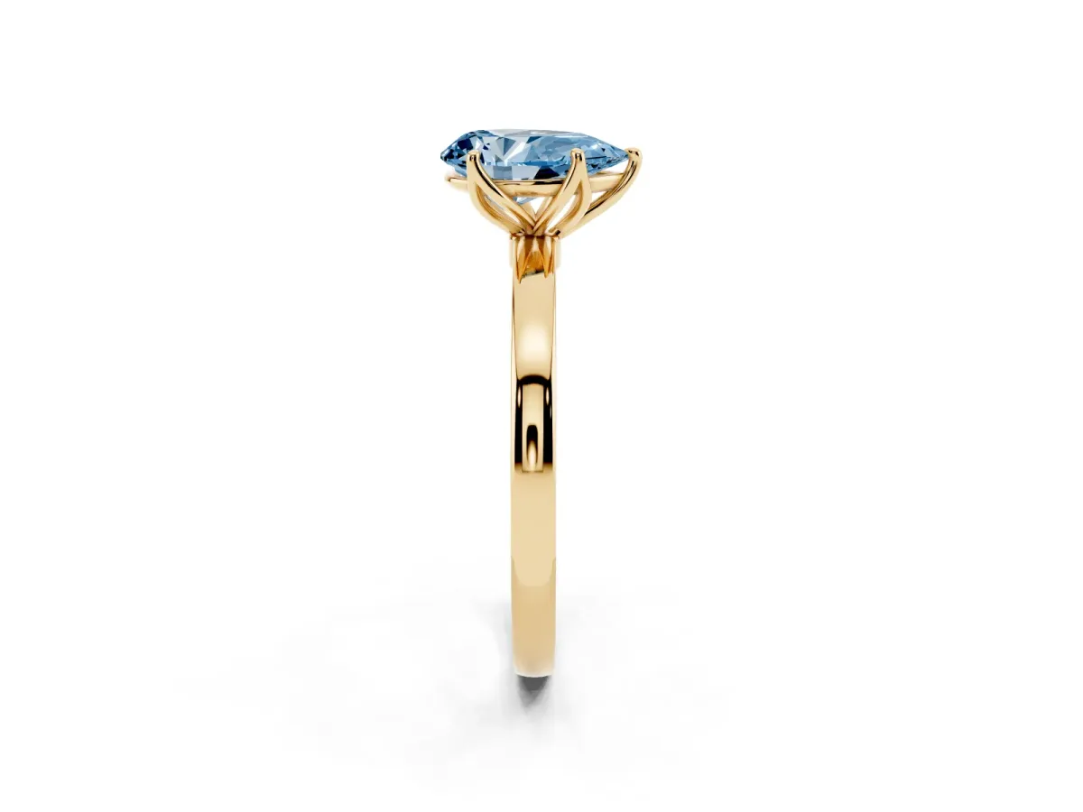 Fancy Blue Pear Cut Diamond Solitaire Ring with Thin Band and Prong Setting Yellow gold