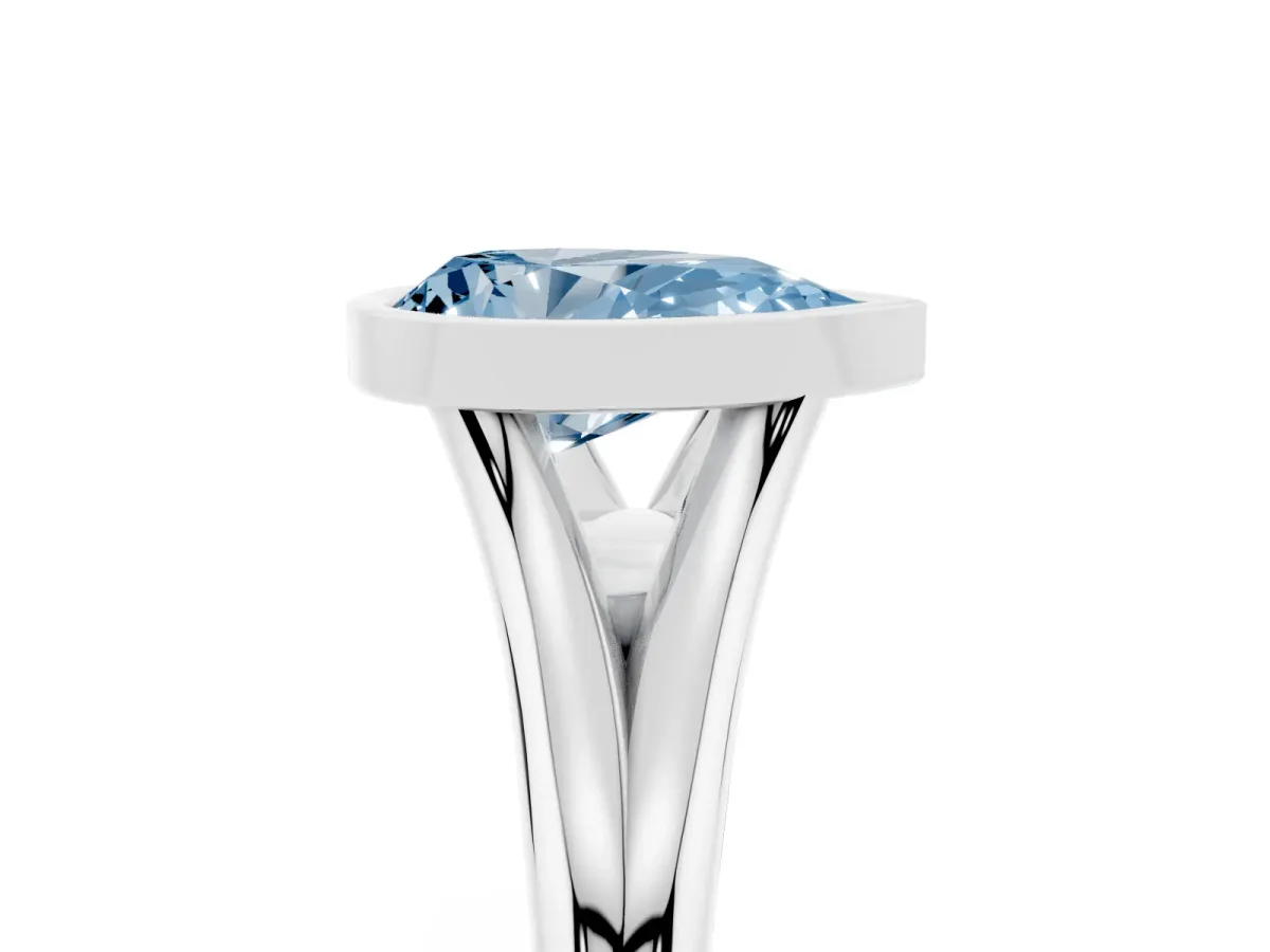 Fancy Blue Bezel Set Pear Cut Cut Solitaire Ring with Tapered Band Platinum
