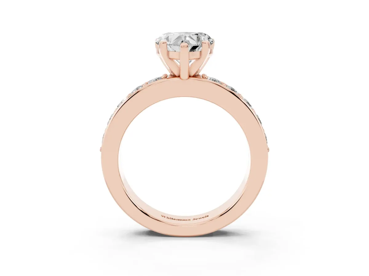 Heart Cut Diamond Engagement Ring with Channel Set Round Band and Prong Setting Rose gold