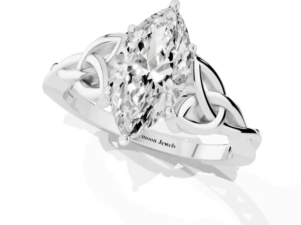 Marquise Cut Diamond Solitaire Engagement Ring with Celtic Knot Band and Four-Prong Setting Platinum