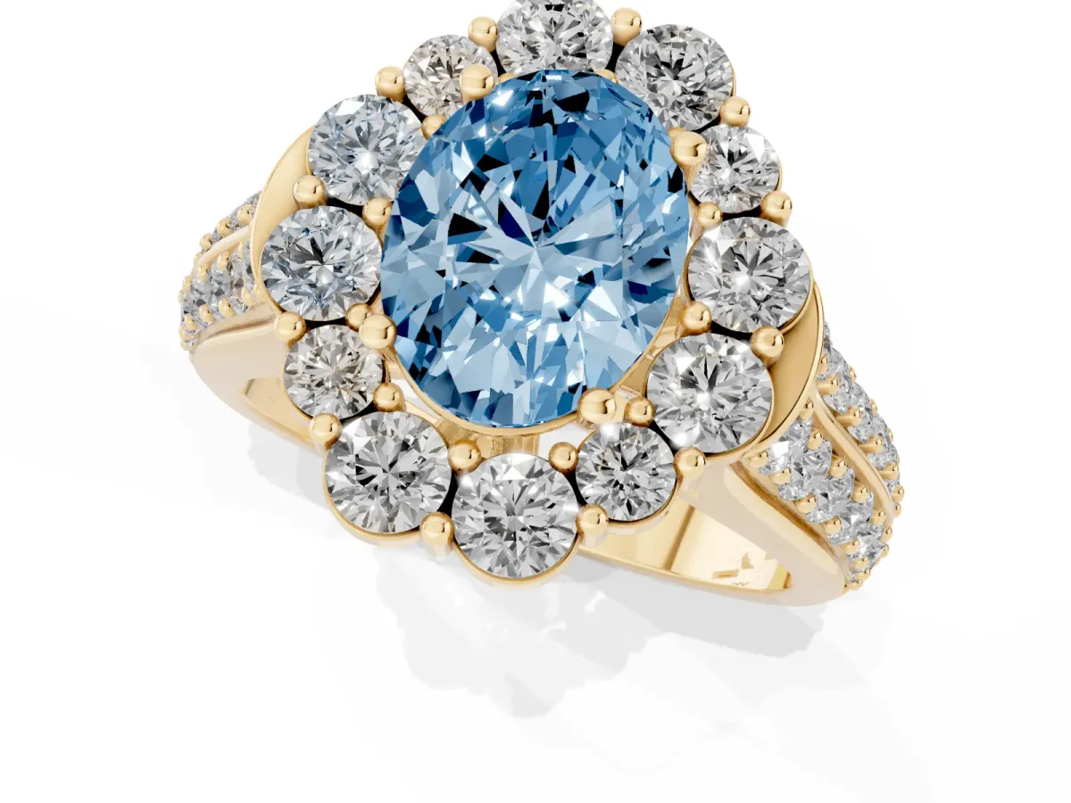 Fancy Blue Oval Cut Halo Diamond Engagement Ring with Split Shank and Prong Setting Yellow gold
