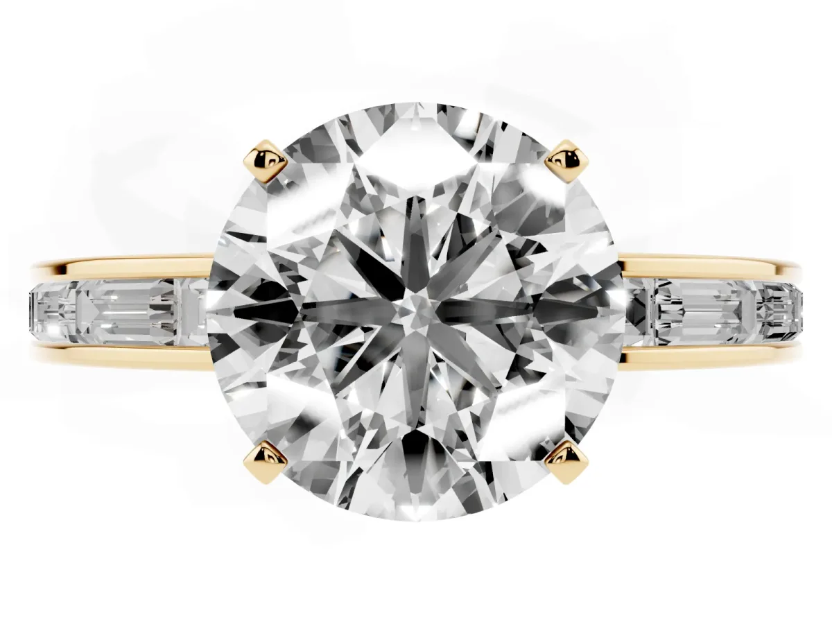 Round Cut Solitaire Diamond Ring with Channel-Set Baguette Band and Four-Prong Setting Yellow gold