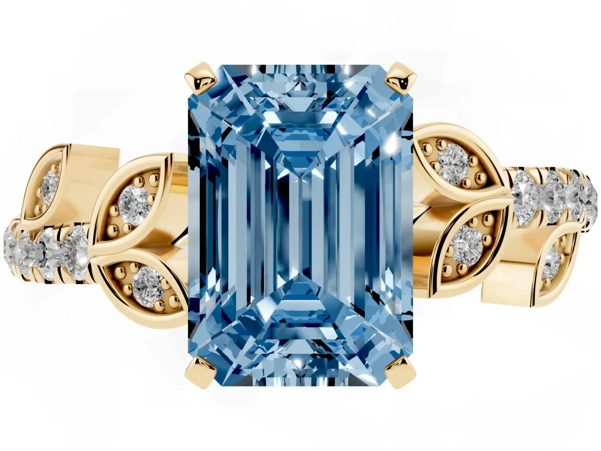 Fancy Blue Emerald Cut Solitaire Leaf-Inspired Diamond Ring with Pavé Band and Four-Prong Setting Yellow gold