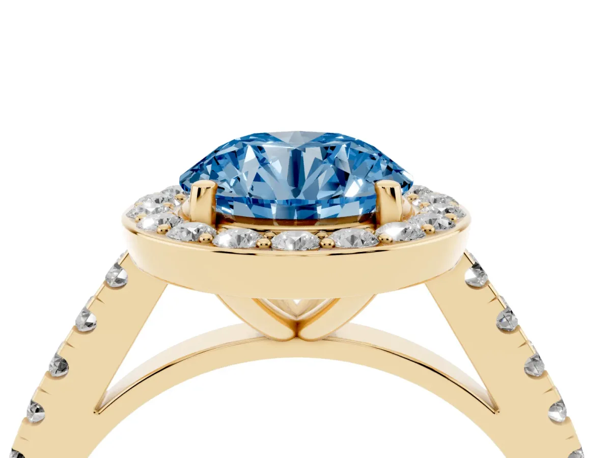 Fancy Blue Round Cut Diamond Halo Ring with Round Pavé Split Shank and Prong Setting Yellow gold