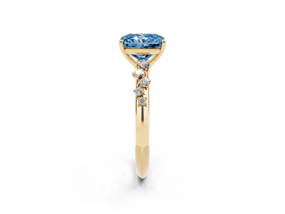 Fancy Blue Radiant Cut Diamond Cluster Side Stone Solitaire Ring with Prong Setting Yellow gold
