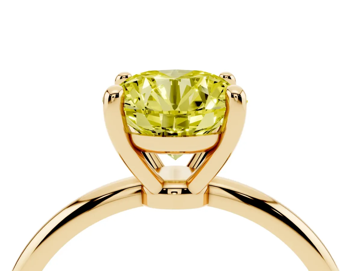 Fancy Yellow Round Cut Solitaire Diamond Ring with 4-Prong Setting on a Classic Band Yellow gold